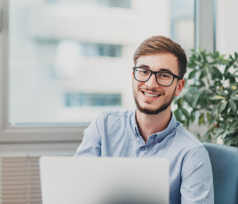 the man working with laptop