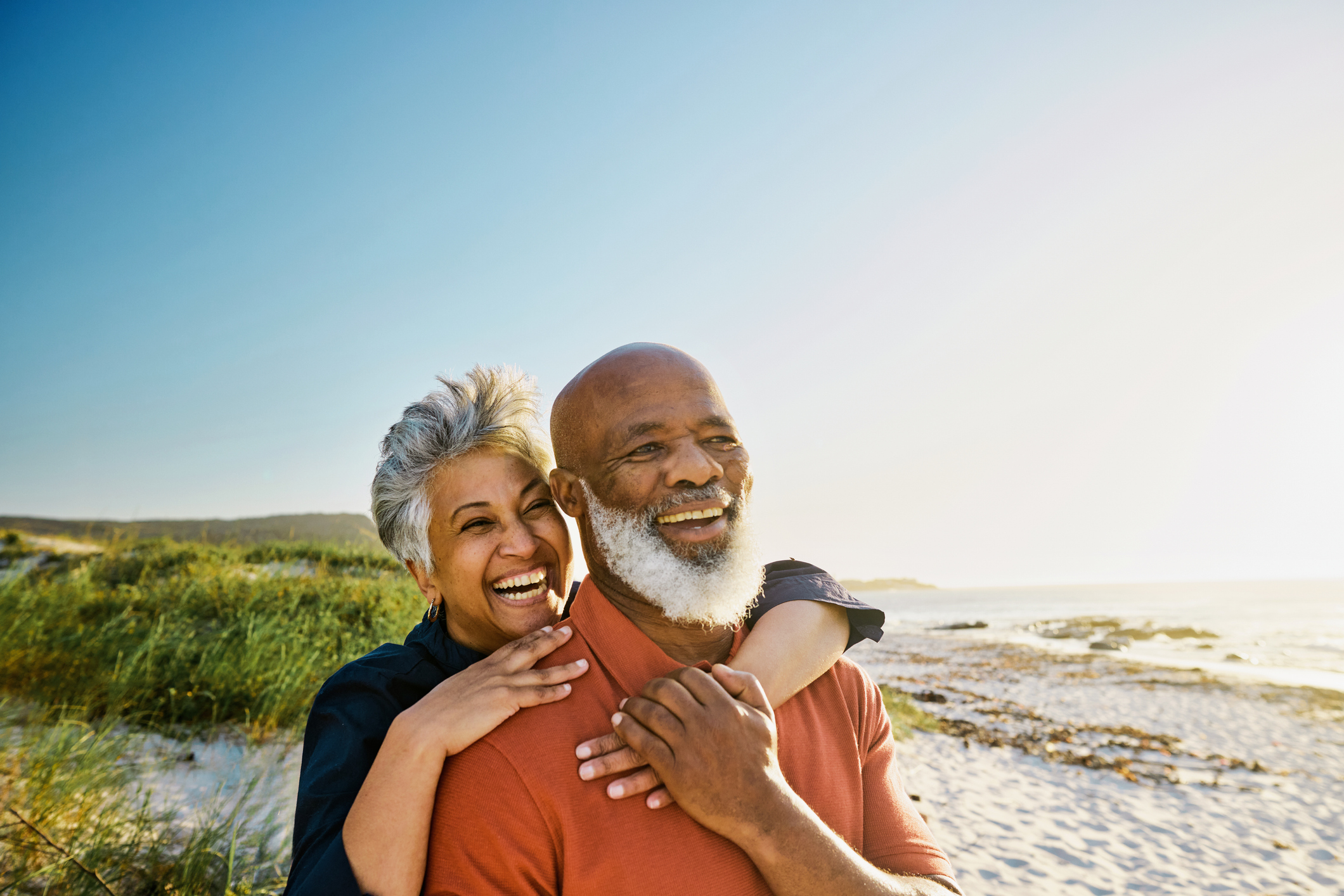 Active Mature African American Couple Enjoying Retirement and Each Others Company at the Beach